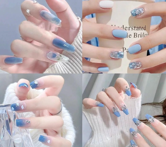 Tổng Hợp Mẫu Nail Màu Xanh Dương Nhạt Đẹp Nhẹ Nhàng Hot Nhất 2025 71 Bàn tay với móng tay được sơn màu xanh và trắng, trang trí họa tiết lấp lánh và hoa văn đa dạng.