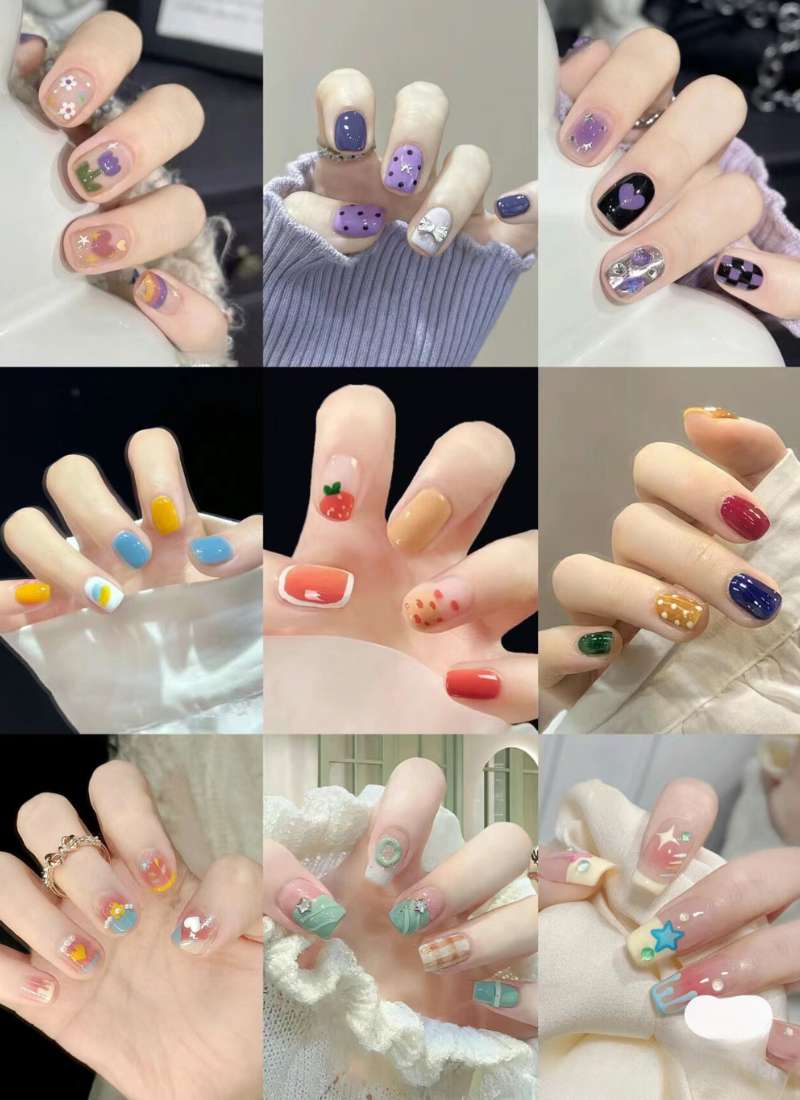 Bộ sưu tập móng tay với nhiều mẫu thiết kế và màu sắc đa dạng, từ hình hoa đến họa tiết trừu tượng.