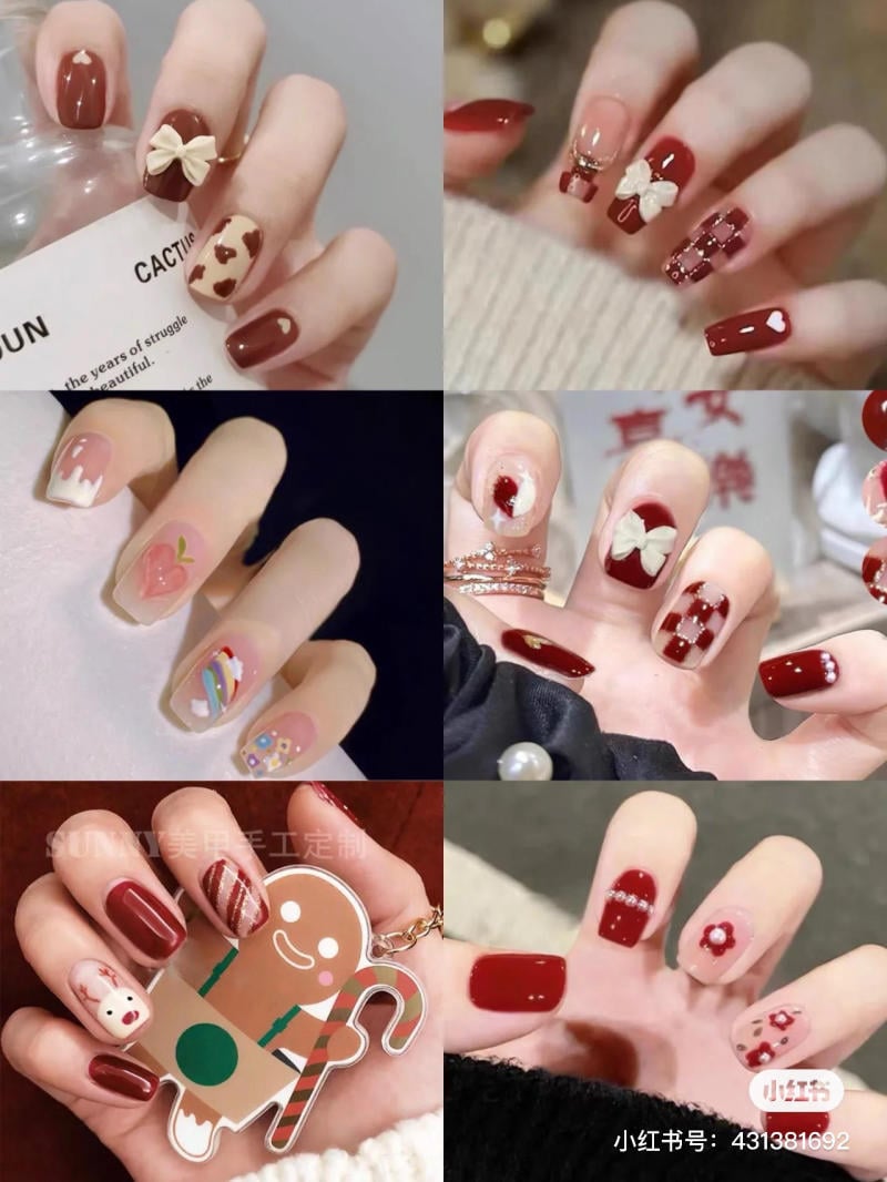 mau-nail-don-gian-cardina__30__a27789fdbd614c778c4d6b018ebf3dd9 Bàn tay với móng tay được sơn và trang trí đa dạng, có họa tiết nơ, hoa, và biểu tượng Giáng sinh.