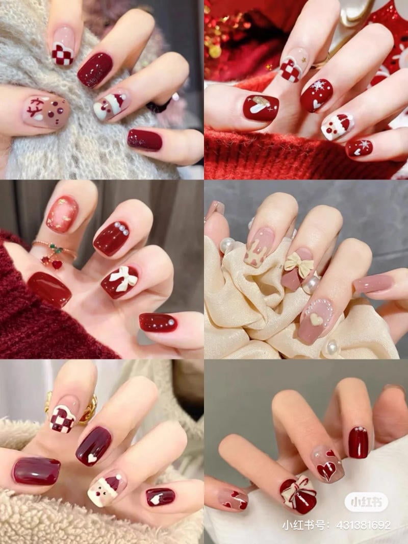 mau-nail-don-gian-cardina__31__d6a0f00c47144405906f7cc669f38b34 Bộ móng tay trang trí với nhiều họa tiết và màu sắc khác nhau, chủ yếu là tông đỏ, trắng và hồng.