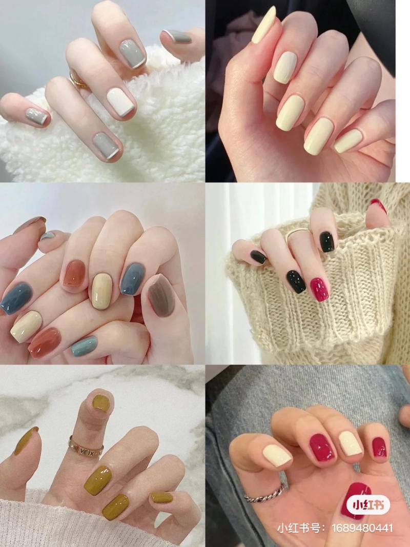 mau-nail-don-gian-cardina__39__adf449fe155f47ecb831d5cd34fd69c9 Bàn tay với nhiều mẫu sơn móng tay khác nhau gồm các màu trung tính và nổi bật.