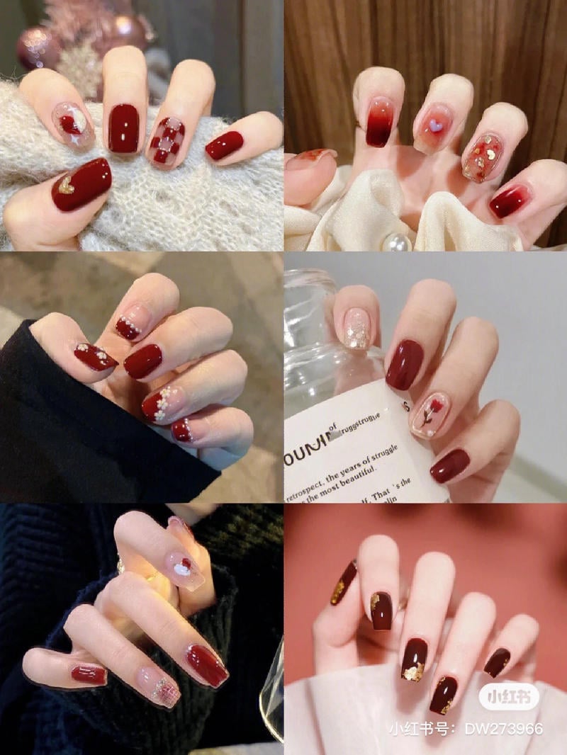 mau-nail-don-gian-cardina__53__3575514b801e4804957d58471b611bb5 Bộ sưu tập móng tay đỏ với nhiều họa tiết trang trí khác nhau, bao gồm hoa văn, trái tim và ánh kim.