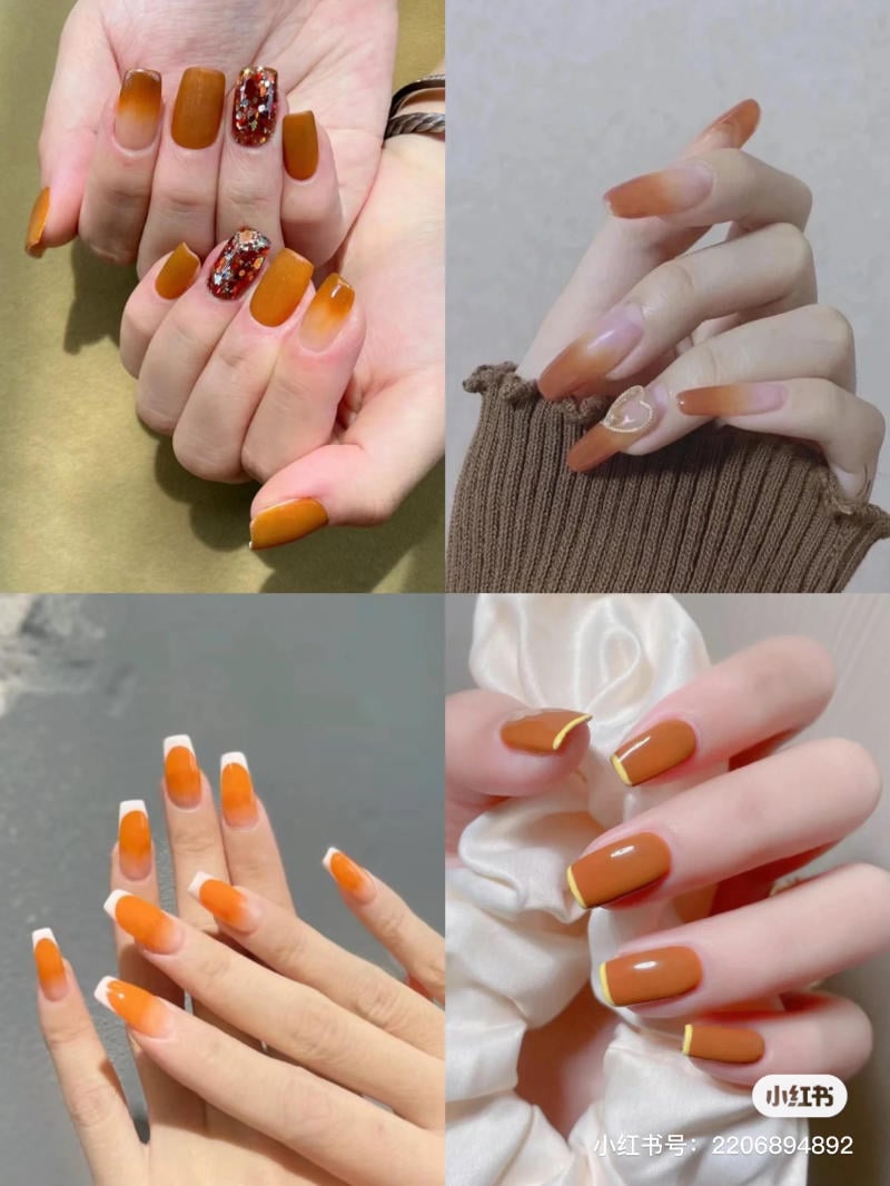 mau-nail-halloween-dep__1__63b02784c735451b8d7198a042bf2500 Bốn kiểu móng tay màu cam khác nhau, với các chi tiết trang trí và phong cách đa dạng.