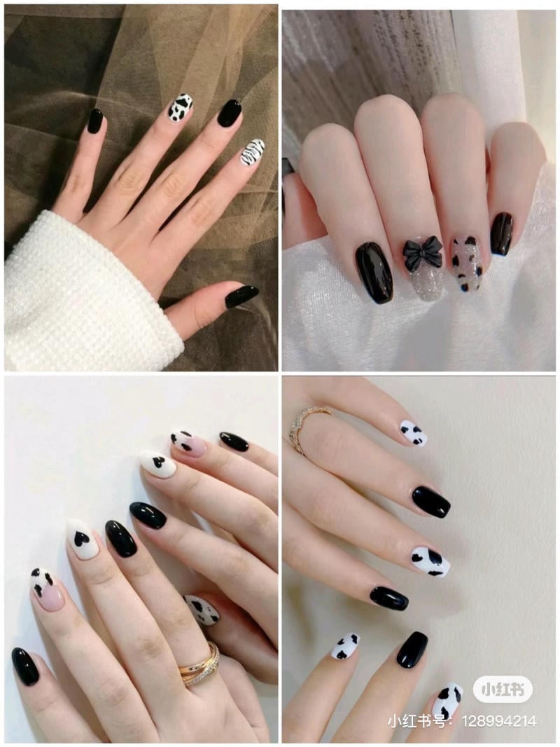 Bộ sưu tập móng tay đen trắng với họa tiết động vật và trái tim, kết hợp các kiểu dáng và trang trí khác nhau.