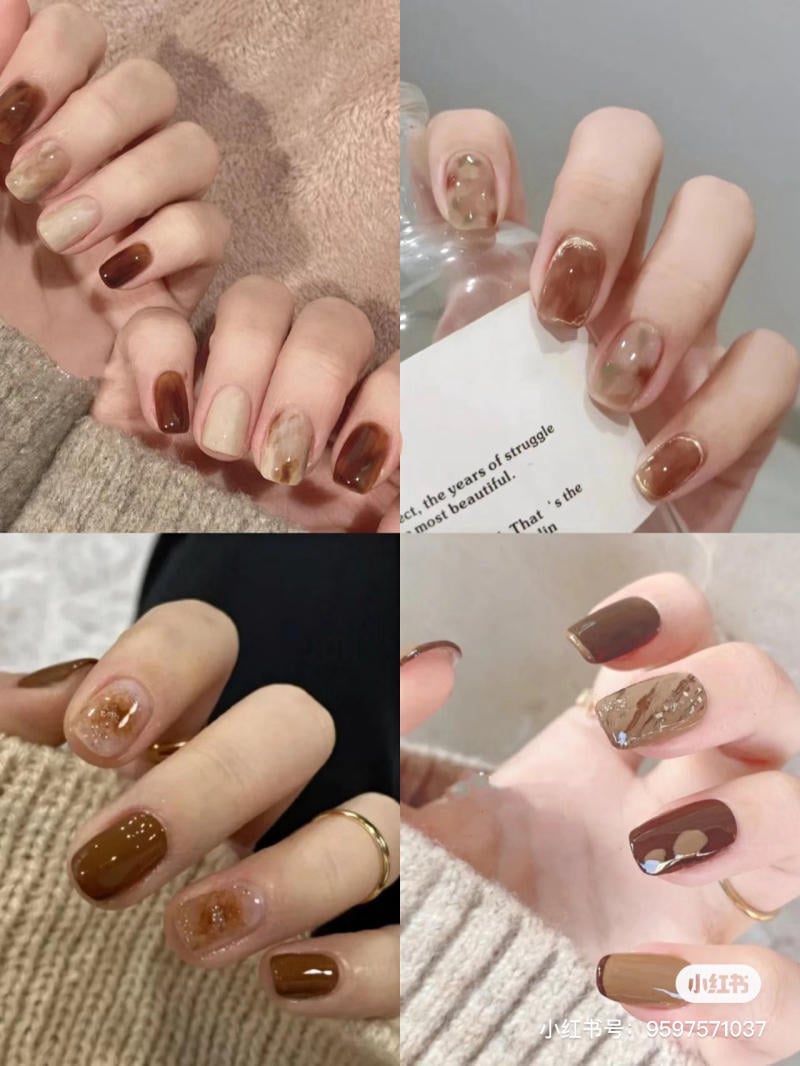 Bộ móng tay với các thiết kế màu nâu và be, trang trí họa tiết đơn giản và nhũ lấp lánh.