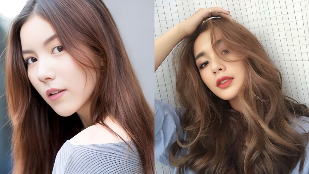 Hai người phụ nữ với mái tóc dài, một người nhìn nghiêng và người kia chạm tay lên tóc, phông nền đơn giản.