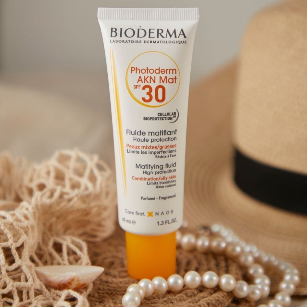 34.12 - thegioiskinfood.com - Kem chống nắng Bioderma Photoderm AKN Mat SPF 30+
