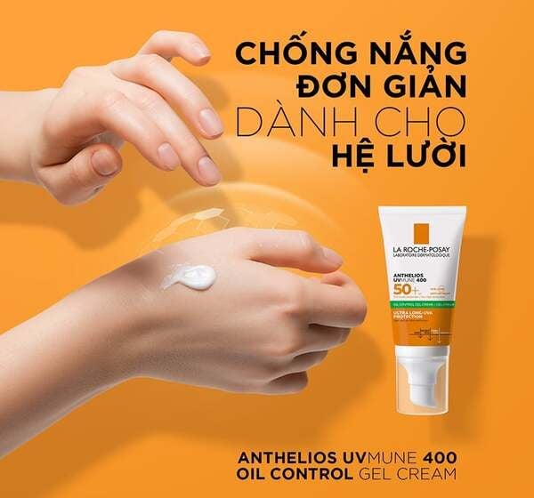 Một tay bôi kem chống nắng, bên cạnh là tuýp kem trên nền cam. Văn bản quảng cáo sản phẩm SPF 50+.
