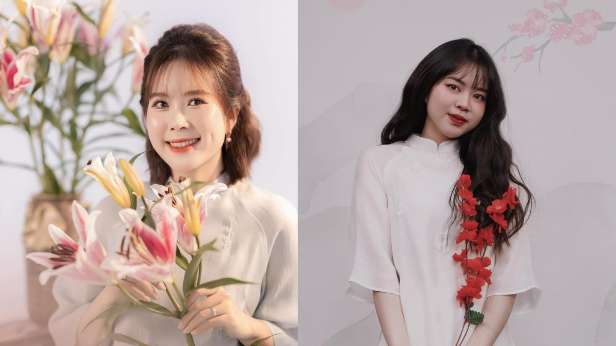 Hai người mặc áo dài trắng, một người cầm hoa ly, người kia cầm hoa đỏ, nền hoa và trang trí nhẹ nhàng.