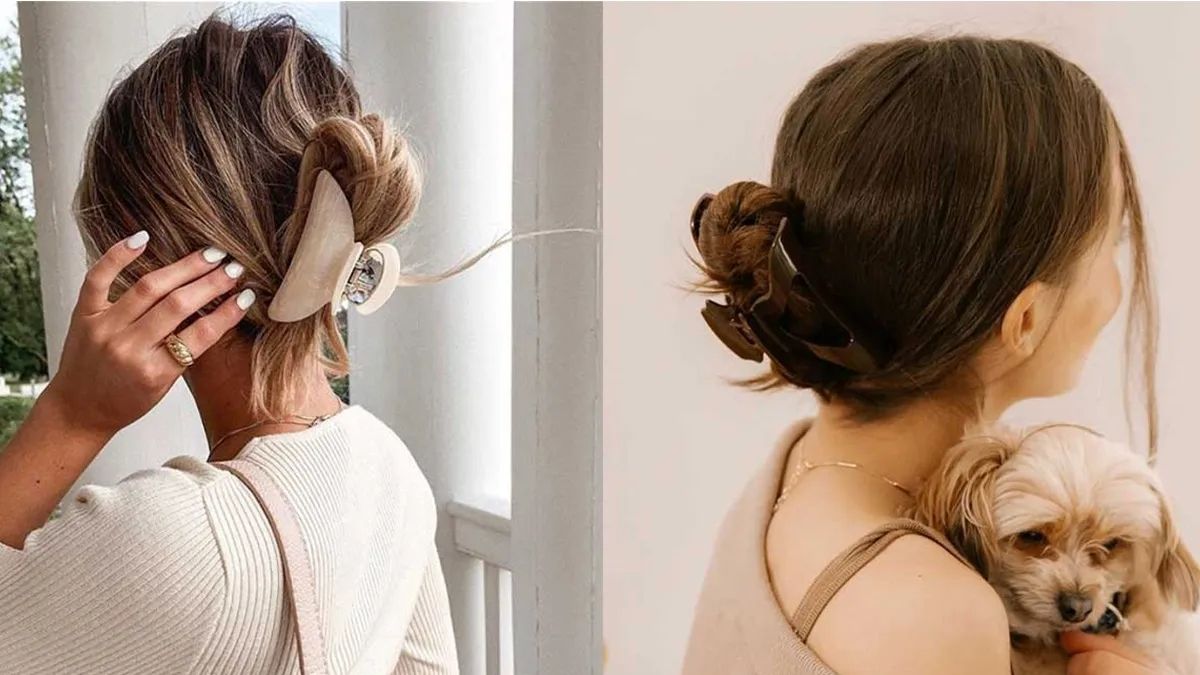 lam-toc-xoan-9 Hình ảnh hai người với tóc búi và kẹp tóc lớn, một người ôm chó nhỏ trong tay.