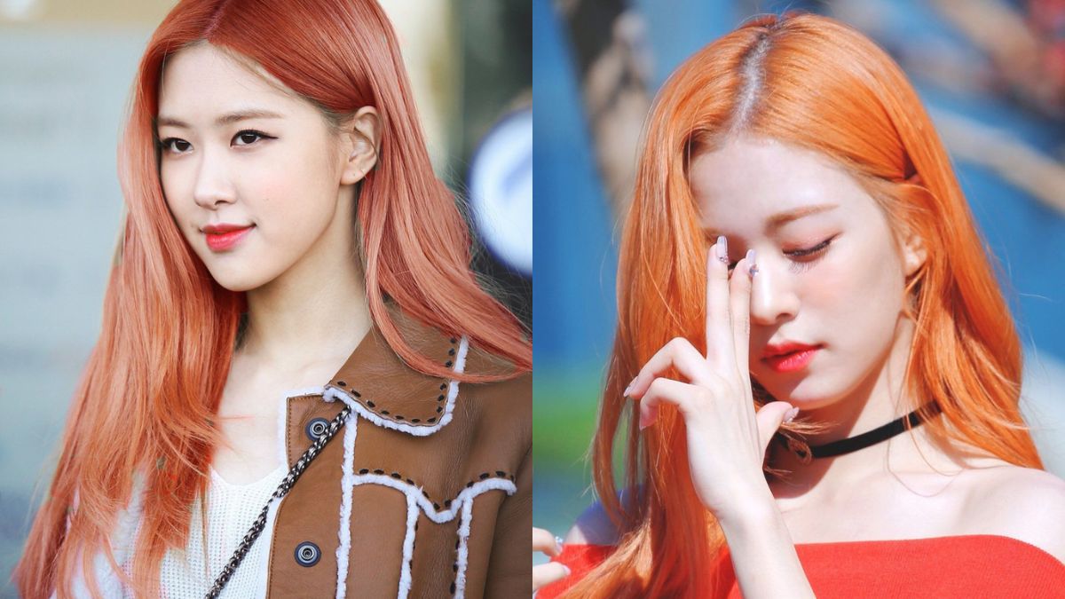 Hai người với m&aacute;i t&oacute;c đỏ cam, một người đang mỉm cười nhẹ, người kia chạm tay l&ecirc;n mặt.