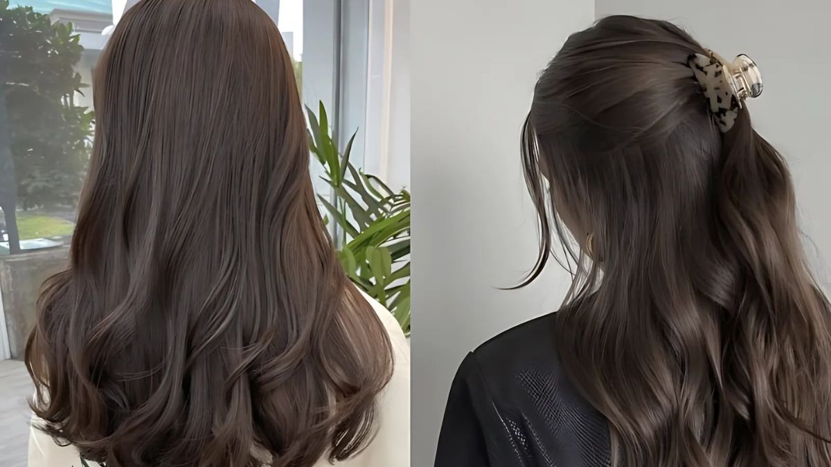 nau-den-2 Hai kiểu tóc dài màu nâu, một thả tự nhiên và một cột nửa đầu bằng kẹp, trong không gian nội thất.