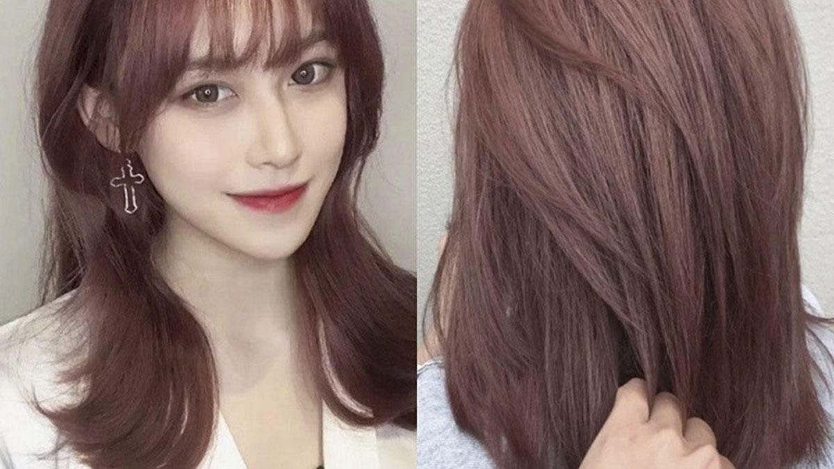 Người có tóc màu nâu đỏ, đeo hoa tai, với một bên hình hiển thị mặt trước, bên kia là mặt sau của mái tóc.
