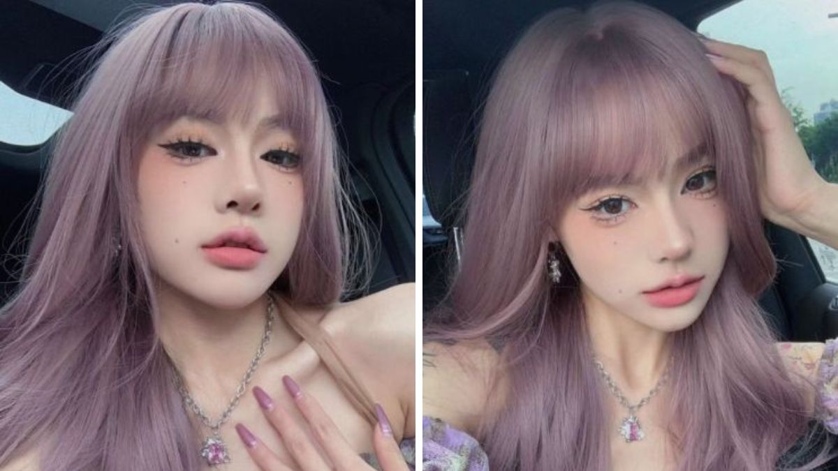 nau-tim-9 Người với tóc dài màu tím, đeo trang sức, chụp ảnh tự sướng trong xe hơi, biểu cảm tự nhiên.