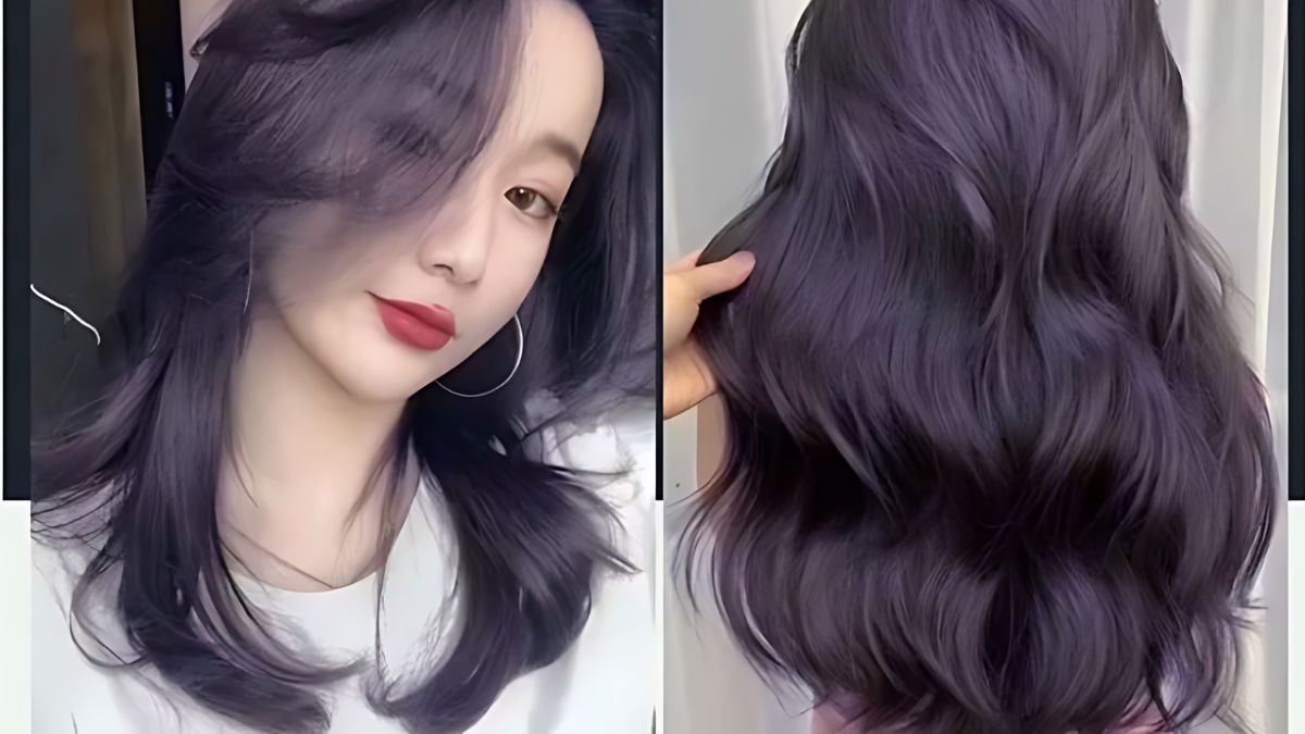 tim-khoi-7 Người có mái tóc dài, nhuộm màu tím đen óng ả, với kiểu tóc uốn lượn sóng mềm mại.