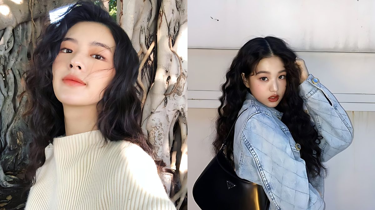 Hai người phụ nữ với mái tóc xoăn, một người đứng trước gốc cây, người kia mặc áo khoác denim đứng trước tường trắng.