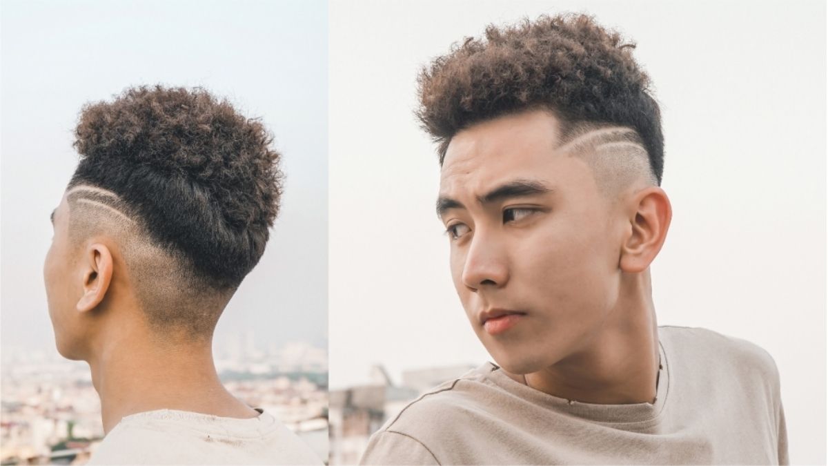 Hai góc nhìn của một người với kiểu tóc cắt ngắn hai bên, có đường kẻ trang trí, tóc trên đỉnh xoăn.