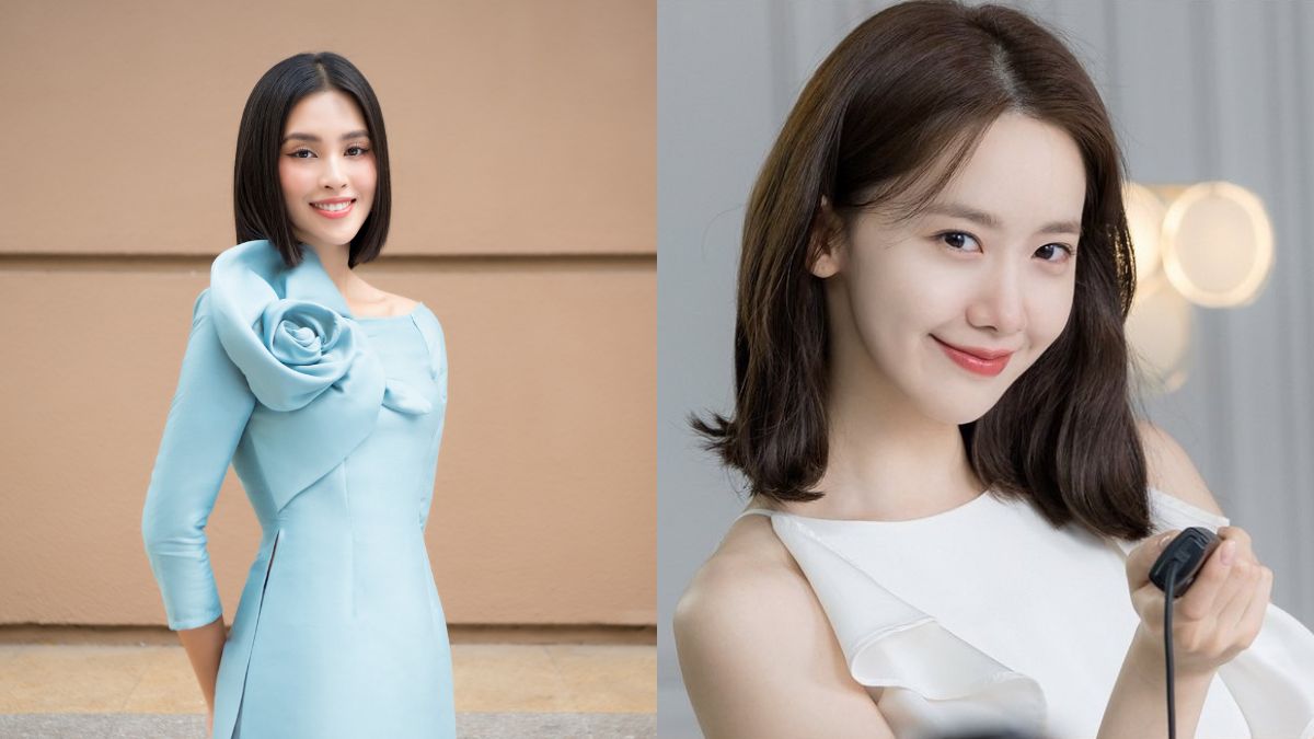 toc-ngan-mac-ao-dai-9 Hai người phụ nữ mỉm cười, một người mặc váy xanh nhạt với hoa, người kia mặc áo trắng đơn giản.