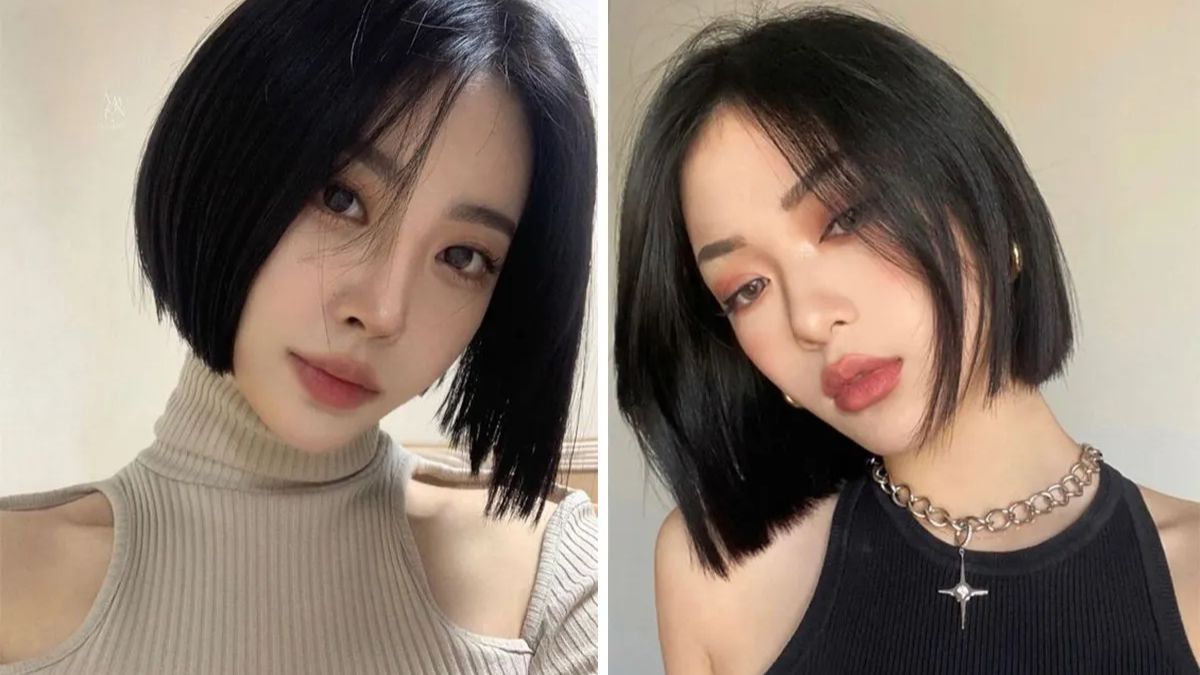 Hai người với kiểu tóc ngắn đen, mặc áo cổ lọ và áo không tay, đang chụp ảnh tự sướng trong nhà.