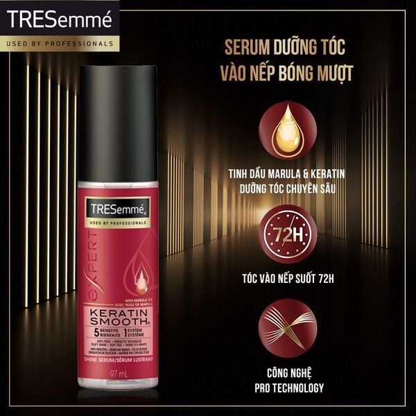 tresemme_professional_keratin_smooth_shine_serum_31ecd0db083e411dab6fb2b5d9612853_grande Hình ảnh chai serum dưỡng tóc TRESemmé Keratin Smooth, nền tối, thông tin về thành phần và hiệu quả sản phẩm.